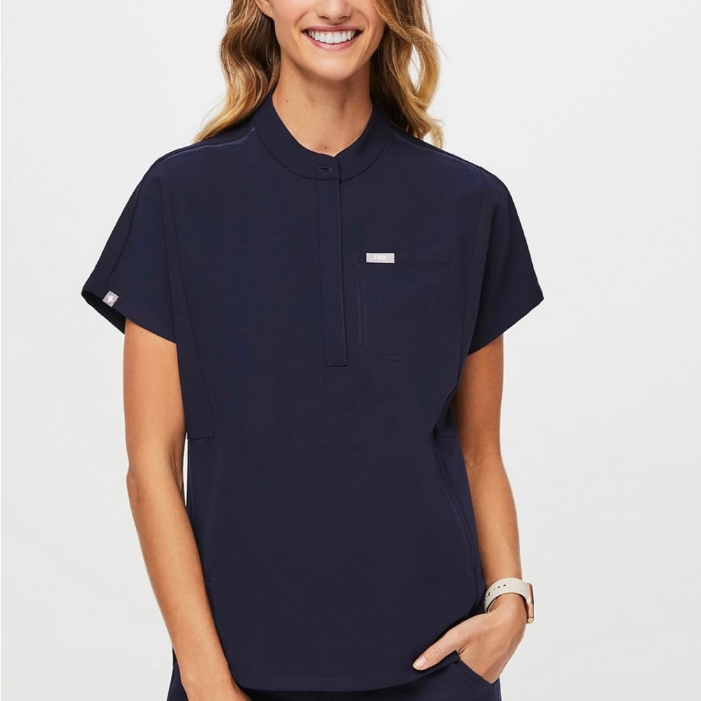 FIGS women’s scrub top. Brand new with tags. Never worn. Bought a size smaller.